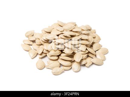 Whole Pumpkin Seeds in Shell Isolated, Raw Pepita Grains, Scattered Green Healthy Nuts, Pumpkin Seed with Skin on White Background Stock Photo