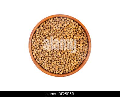 Coriander Seeds in Wood Bowl Isolated, Cilantro Grain, Chinese Parsley Seed Group, Dry Spices, Seasonings, Coriander Herb on White Background Top View Stock Photo