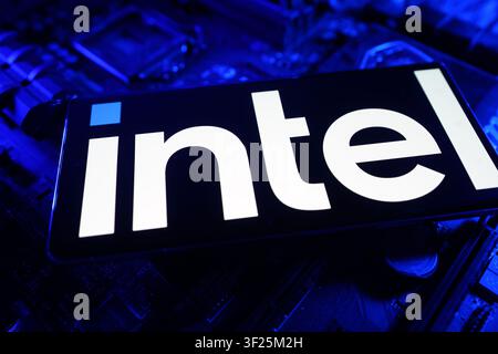 Intel Logo Displayed on Computer Chip Circuit Board CPU Motherboard Representing Semiconductor Processing and Computer Technology Innovation Stock Photo