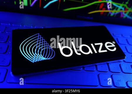 Blaize Artificial Intelligence Semiconductor Company Logo On Smartphone With Stock Market Financial Performance Chart Stock Photo