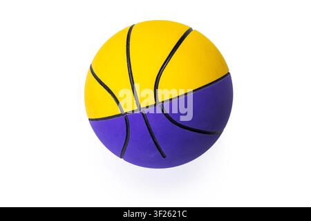 Yellow and purple toy basketball isolated on white background Stock Photo