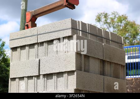 Grey concrete blocks stack delivery Stock Photo