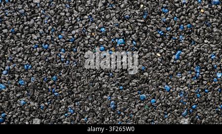 Abstract pebbles background with black and blue snones wall grain grunge  texture for web banner template or wallpaper design Stock Photo