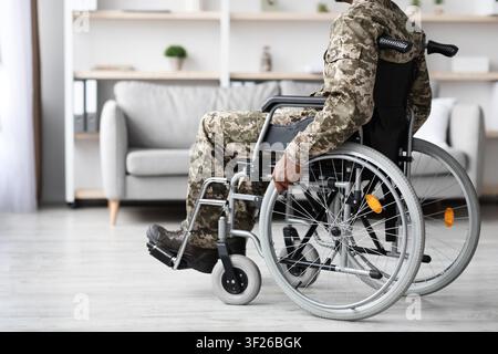 Unrecognizable Black Male Veteran In Wheelchair At Home, Empowerment Concept Stock Photo