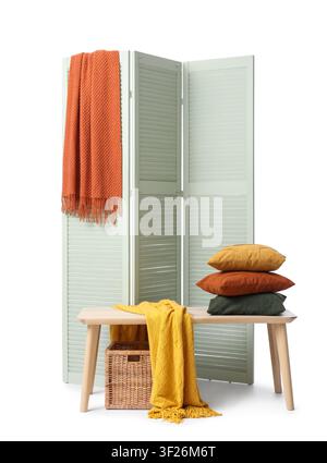 Cozy home interior with wooden bench decorative pillows knitted blankets and a room divider isolated on white background Stock Photo