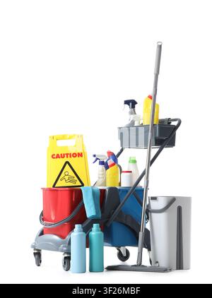Professional cleaning service cart with various supplies and a caution wet floor sign, isolated on a white background Stock Photo