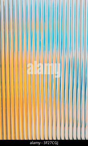 Abstract vertical lines creating blue orange texture background Stock Photo