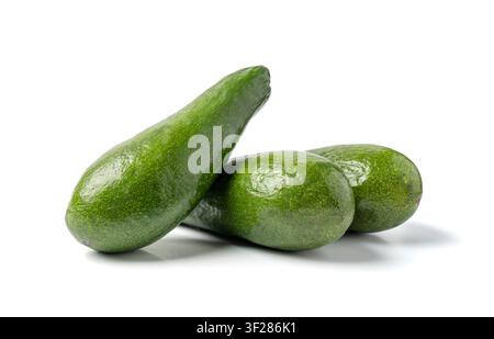 Avocado Isolated, Whole Avokado Set, Three Green Avocados Pile, Fresh Alligator Pear, Guacamole Ingredient, Long Avocado Fruit on White Background Stock Photo