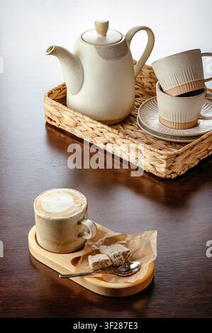 Morning coffee and tea served in ceramic pottery Stock Photo