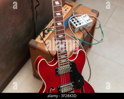an electric guitar and amplifier, concept of a bedroom studio and hobbies Stock Photo