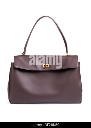 Womens medium leather handbag chocolate brown with gold twist lock and flap isolated on white background front view Stock Photo