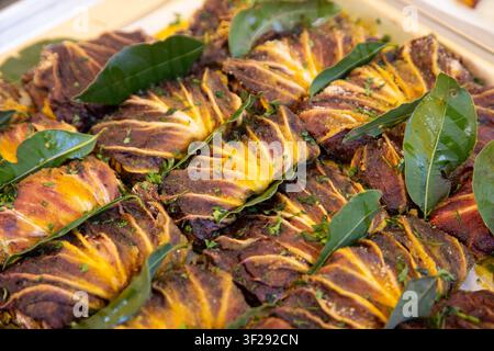 Ballaro Market Palermo street food stall with wine and assorted sicilian street food. Stock Photo