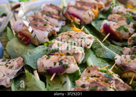 Ballaro Market Palermo street food stall with wine and assorted sicilian street food. Stock Photo