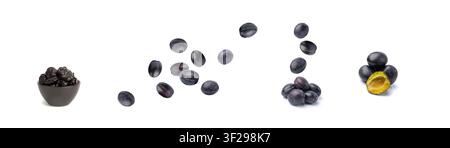 Falling Plum Isolated, Whole Blue Prune Pile, Flying Ripe Fresh Plums, Dark Blue Healthy Stone Fruits, Plums on White Background Stock Photo