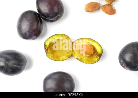 Plum Isolated, Whole Blue Prune Pile, Ripe Fresh Plums, Dark Blue Healthy Stone Fruits, Plums on White Background Stock Photo