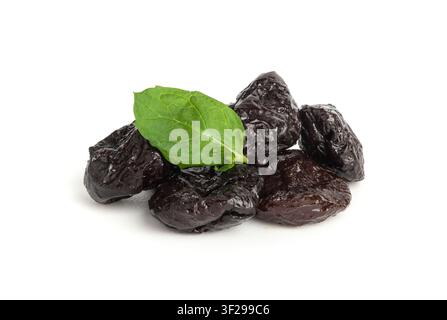 Dry Plums Isolated, Dried Black Fruits Pile, Prune Group, Natural Dessert, Healthy Diet, Dry Plum Fruit on White Background Stock Photo