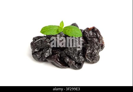 Dry Plums Isolated, Dried Black Fruits Pile, Prune Group, Natural Dessert, Healthy Diet, Dry Plum Fruit on White Background Stock Photo