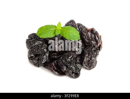 Dry Plums Isolated, Dried Black Fruits Pile, Prune Group, Natural Dessert, Healthy Diet, Dry Plum Fruit on White Background Stock Photo