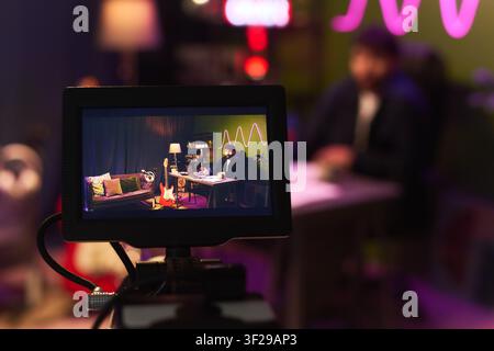 Man Recording Video Content in Studio for Online Broadcasting Stock Photo