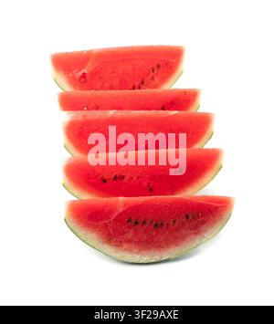 Watermelon slices isolated. Water melon wedges pile, chopped Citrullus lanatus pieces, red wassermelone cuts group, fruit piece, watermelon on white b Stock Photo