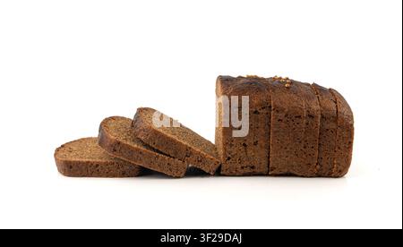 Black rye bread isolated, dark brown sliced loaf, sourdough borodinsky rugbrod square slices with coriander on white background Stock Photo