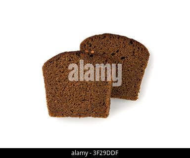 Black rye bread isolated, dark brown sliced loaf, sourdough borodinsky rugbrod square slices with coriander on white background Stock Photo
