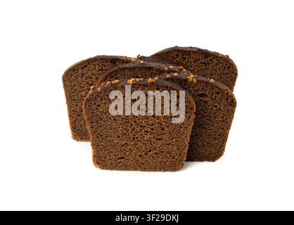 Black rye bread isolated, dark brown sliced loaf, sourdough borodinsky rugbrod square slices with coriander on white background Stock Photo