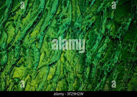 Abstract green textured glass background, vibrant emerald wavy pattern for creative design and wallpaper, ideal for design and print Stock Photo
