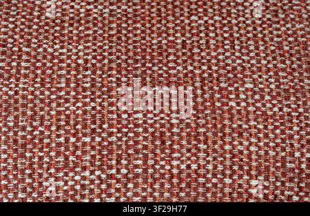 Red orange woven fabric texture close up, upholstery textile background with white striped thread pattern Stock Photo