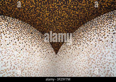 Symmetrical mosaic tile ceiling corner with gold gradient pattern, luxury hammam spa architecture detail, abstract mosaic tile pattern Stock Photo