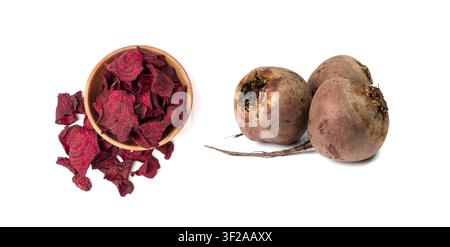 Dry beetroot chips isolated, dried sliced red beet flakes pile, beet root pieces and chips, dehydrated deep fried vegetable root heap on white backgro Stock Photo