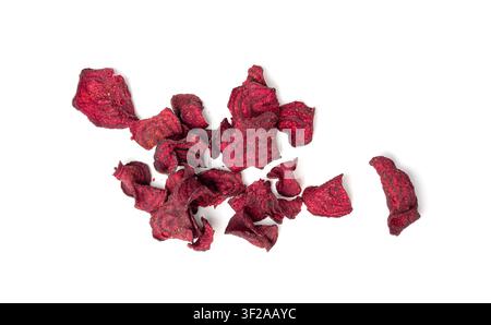 Dry beetroot chips isolated, dried sliced red beet flakes pile, beet root pieces and chips, dehydrated deep fried vegetable root heap on white backgro Stock Photo