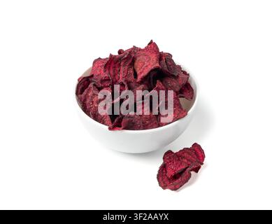 Dry beetroot chips isolated, dried sliced red beet flakes pile, beet root pieces and chips, dehydrated deep fried vegetable root heap on white backgro Stock Photo