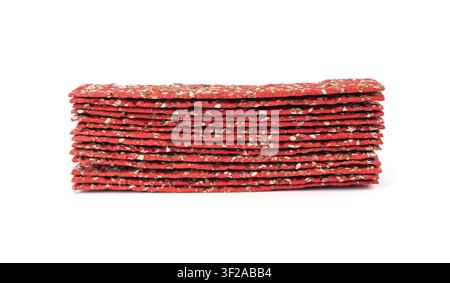 Beetroot crackers isolated, thin rusk beet root bread, red diet multigrain crispbread, various seeds whole grain crisp bread, long cracker on white ba Stock Photo
