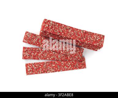 Beetroot crackers isolated, thin rusk beet root bread, red diet multigrain crispbread, various seeds whole grain crisp bread, long cracker on white ba Stock Photo