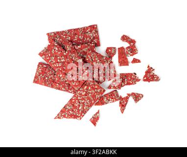 Beetroot crackers pieces isolated, crumbled thin rusk beet root bread pile, broken red diet multigrain crispbread with various seeds, crisp bread, lon Stock Photo