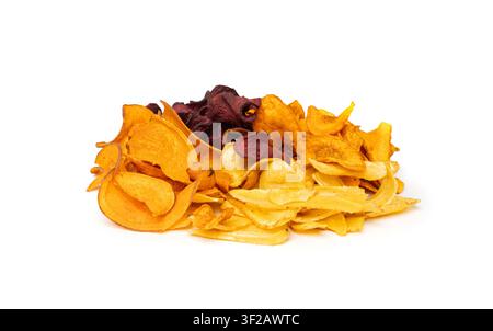 Parsnips, sweet potato, carrot and beetroot chips isolated, dry vegetable root mix, healthy snacks pile on white background Stock Photo