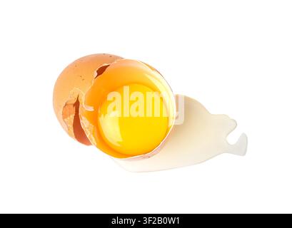 Broken Egg Isolated, Raw Yolk and White, Cracked Brown Shell, Fresh Broken Organic Chicken Eggs on White Background Stock Photo