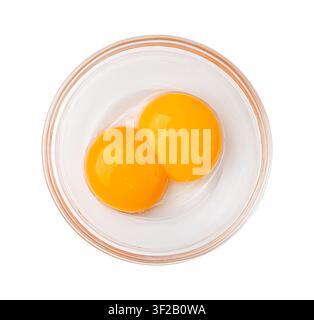 Egg Yolks in Bowl, 2 Fresh Chicken Egg Yolk Separated from Whites for Cooking Recipe, Two Organic Yolks in Glass Bowl Stock Photo