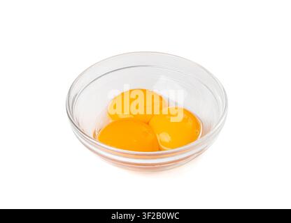 Egg Yolks in Bowl, 3 Fresh Chicken Egg Yolk Separated from Whites for Cooking Recipe, Three Organic Yolks in Glass Bowl Stock Photo