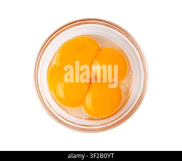 Egg Yolks in Bowl, 4 Fresh Chicken Egg Yolk Separated from Whites for Cooking Recipe, Four Organic Yolks in Glass Bowl Stock Photo