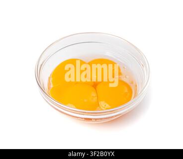 Egg Yolks in Bowl, 4 Fresh Chicken Egg Yolk Separated from Whites for Cooking Recipe, Four Organic Yolks in Glass Bowl Stock Photo