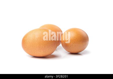 Chicken Eggs Isolated, Whole Poultry Egg, Fresh Healthy Farm Food, Easter Concept, Brown Poultry Chicken Eggs Group on White Background Stock Photo