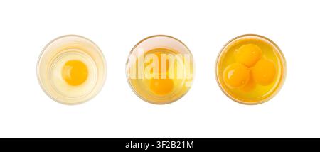 Broken Egg in Glass Isolated, Raw Yolk and White, Fresh Broken Organic Chicken Eggs Set on White Background Top View Stock Photo