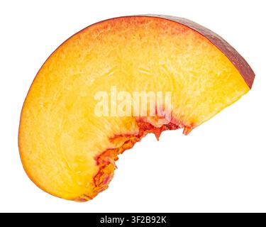 Falling peach slice isolated on white backgroundw Stock Photo