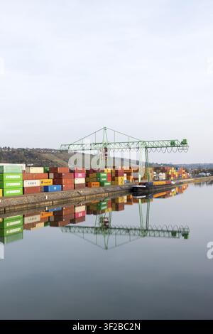 Shipyard Container Vessel Example A view of containers stacked on a ship in Qinzhou Port in southern ...