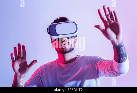 Modern digital entertainment. Man uses virtual glasses Stock Photo