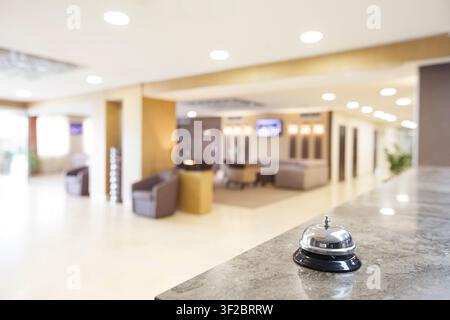 Hotel reception counter desk with service bell Stock Photo