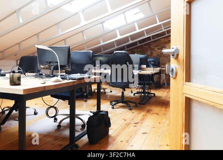 Empty interior office. Tables with computers and chairs Stock Photo