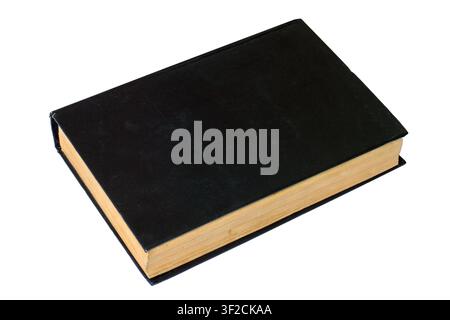 An old book with a black blank cover on a white background. Close-up of a book with a leather cover Stock Photo